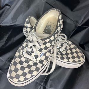 Checkered Vans- size 7 Lace up athletic shoes. Black and white.